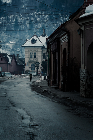 Predeal/Romania/ january 28, 2019: White snow roof of an old public building at the base of the mountain in the winterのeditorial素材