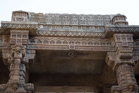 Ahmedabad / India / April 11, 2017: Detail of the entrance in the stepwell made of stone