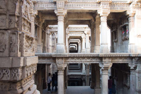 Ahmedabad / India / April 11, 2017: Stepwell structure with more stories made of sandstone