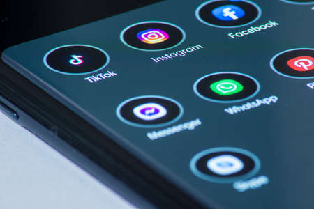 Vienna / Austria / November 13, 2020: Tik Tok, Instagram and other social media apps on the black thin smartphoneのeditorial素材