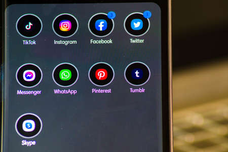 Vienna / Austria / November 13, 2020: Smartphone with social media applications, Tik Tok, Instagram, Facebook, in the group with other appsのeditorial素材