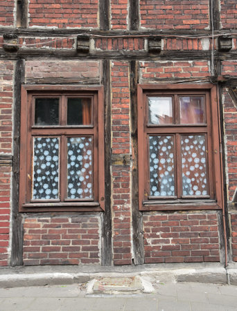 Old wooden door with a lattice in the old town of Poznan, Polandの写真素材