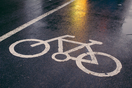 Bicycle sign on the road after the rain,Beijing