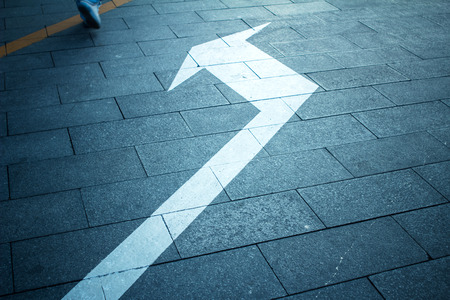 the direction on the floor,a arrowの写真素材