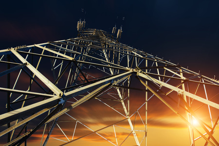 High voltage tower at sunsetの写真素材