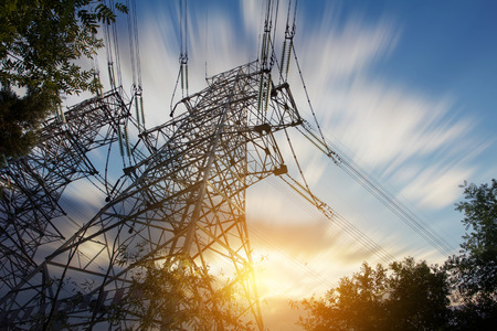 High voltage tower at sunsetの写真素材