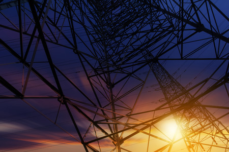 High voltage tower at sunsetの写真素材