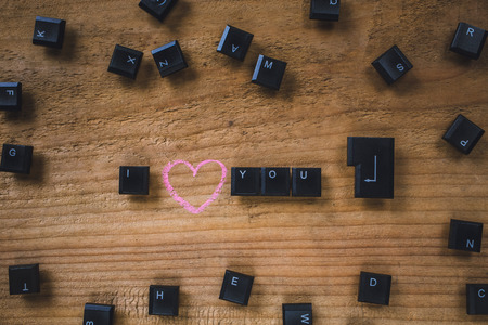 Keyboard keys on the board,i love youの写真素材