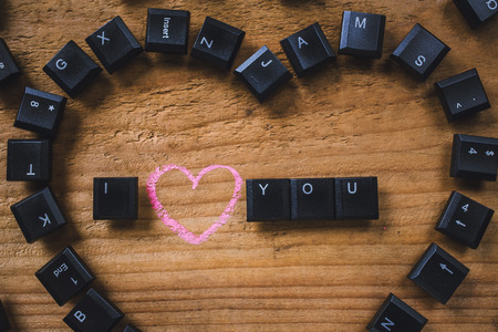 Keyboard keys on the board,i love youの写真素材