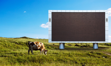 Led billboard in grassland in summerの写真素材