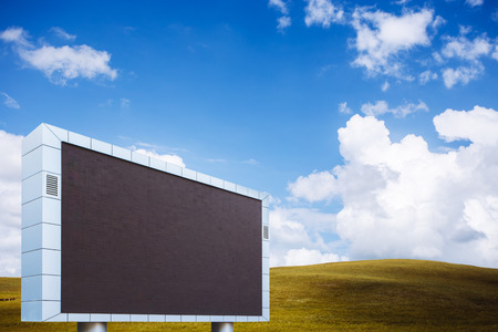 Led billboard in grassland in summerの写真素材