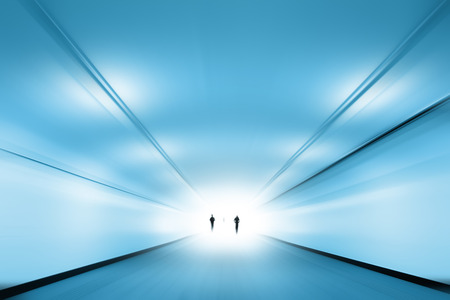 Abstract person walking in the time tunnelの写真素材
