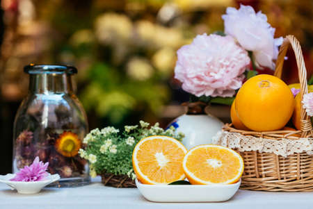 Ripe Navel orange and flower