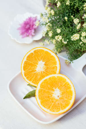 Ripe Navel orange and flowerの写真素材
