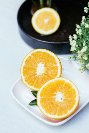 Ripe Navel orange and flowerの写真素材