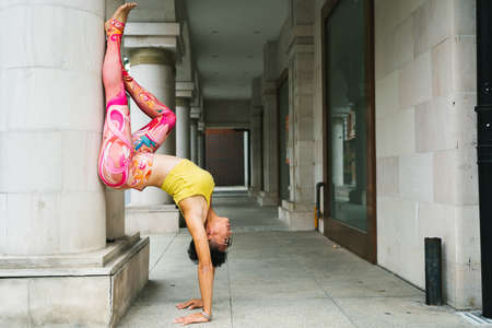 Young woman practice yoga in the park