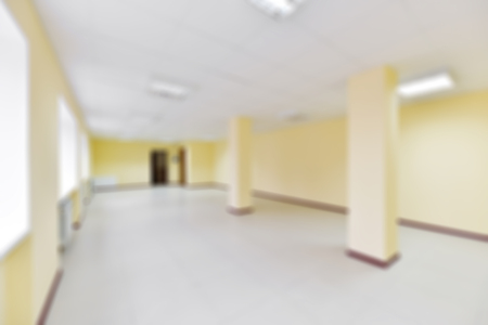 Blurred background of an empty room for business or officeの写真素材