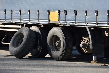 Replacing the wheel on the trailer truckの写真素材