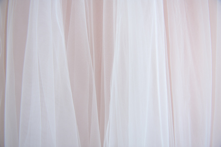 Beautiful tulle fabric on a pink bride dress.の写真素材