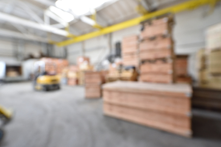 Beautiful blurred background in a warehouse with wooden boxes.の写真素材