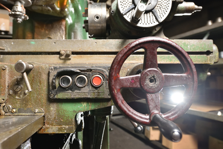Detail of a very old CNC machine, buttons and control wheel, very dirtyの写真素材