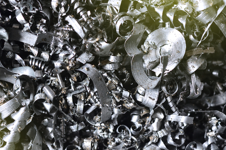 A lot of metal shavings after working on a milling machine or CNC machine.の写真素材