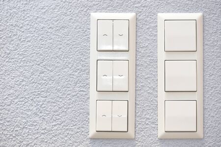 Wall-mounted light switches and roller shutter control for windows