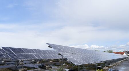 A field with solar panels for power generation.