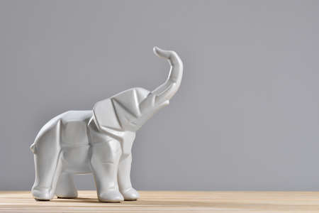 White elephant statues in geometry style with a copy spaceの写真素材
