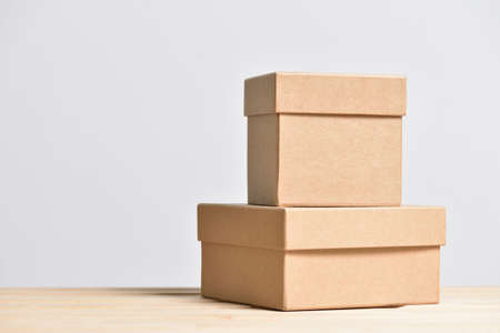 Gift boxes made of cardboard on gray backgroundの写真素材