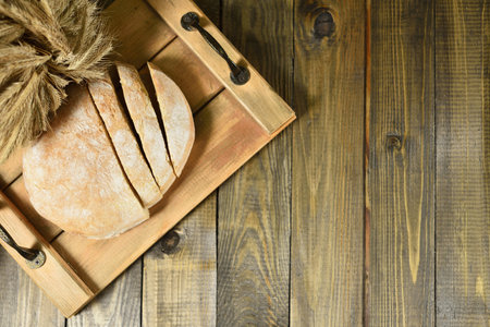 Fresh sliced homemade bread lies on a cutting board