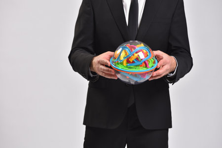 Business person playing puzzle ball, brain storm conceptの写真素材