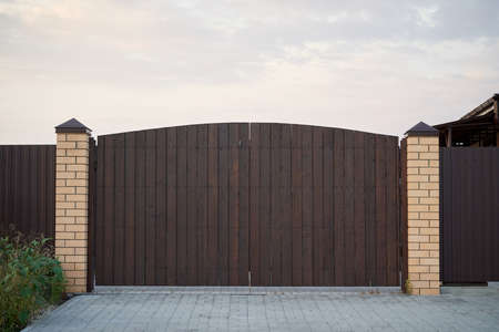 Minimalistic brown wooden gateの写真素材