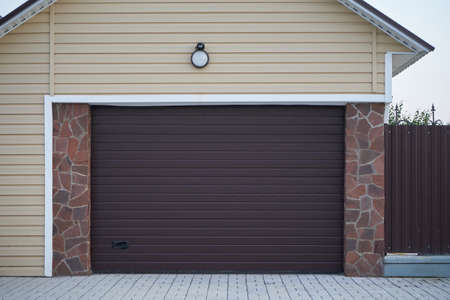 Automatic lifting garage door brownの写真素材
