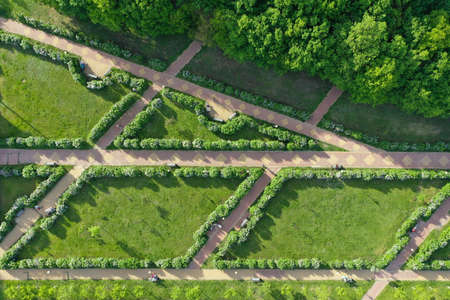 Aerial view of spring park with geometric lines walking paths