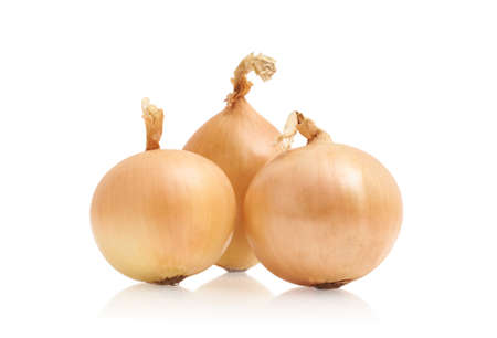 Fresh and ripe onion on white isolated background.の写真素材