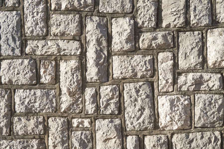texture of gray stone wall made of concrete