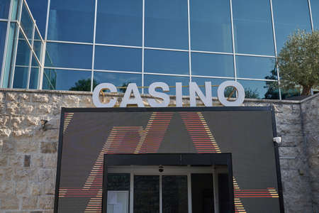 Advertising sign of the casino on the facade of the building.の写真素材