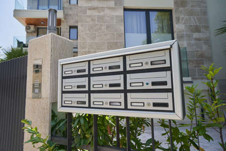 Mailboxes for a modern residential apartments building.