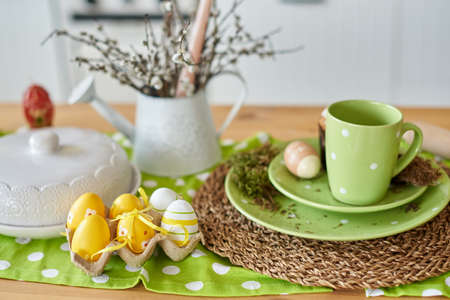 yellow Easter eggs on the table in the kitchen for decoration.の写真素材