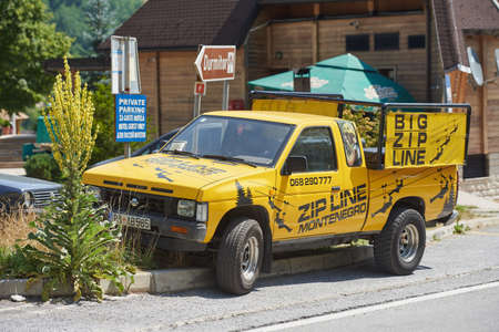 ZABLJAK, MONTENEGRO - JULY 27, 2021: Company car for transporting tourists to the zip line base