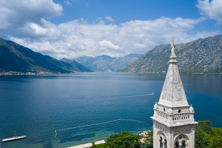 Scenic view of the Bay of Kotor through the tower of the church in Montenegroの写真素材