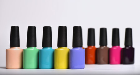 Colourful nail polishes bottles, close upの写真素材
