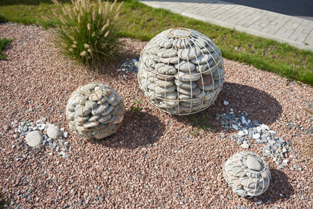 Landscaping decoration made of ball-shaped from pebble stoneの写真素材