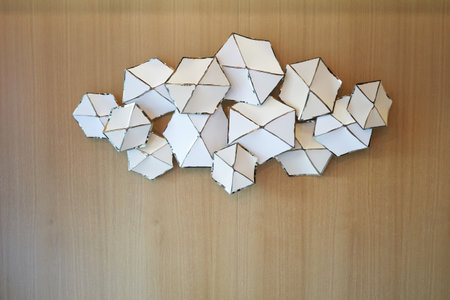Stylish white wall lamp resembling umbrellas