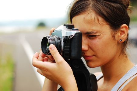 young female photographerの写真素材