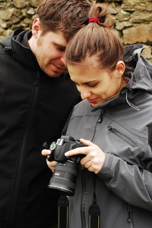 couple with digital cameraの写真素材