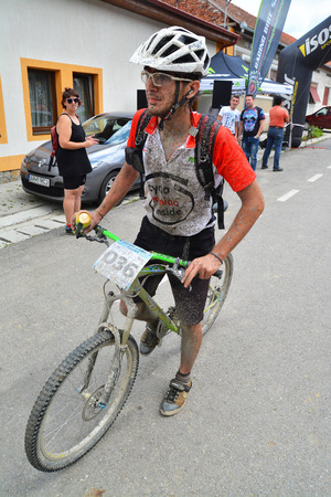Athlete finishing a mountain bike marathon raceのeditorial素材