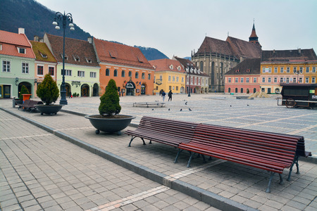 the center of the old brasov city  in romania with the famous black church in the background.のeditorial素材