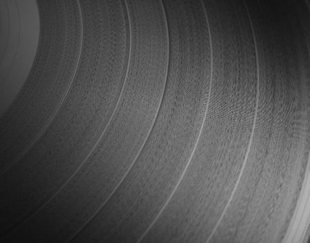 detail of the pattern of a black vinyl recordの写真素材